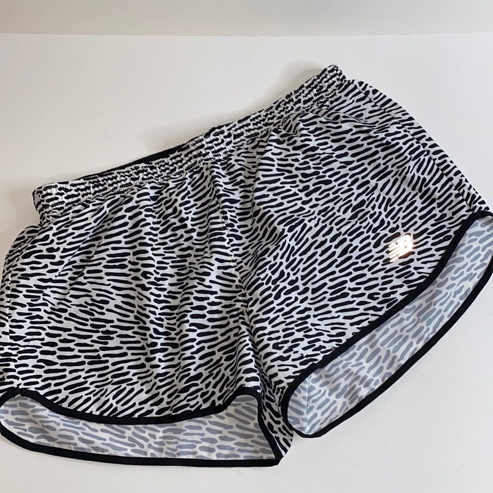 New Balance Running shorts white w/black print.